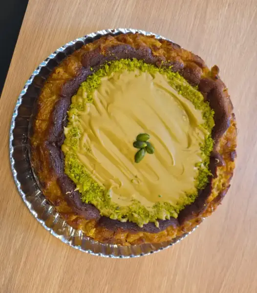 Tarta de queso de pistacho en La Artesana, Parla